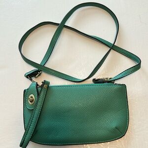 That green shoulder bag